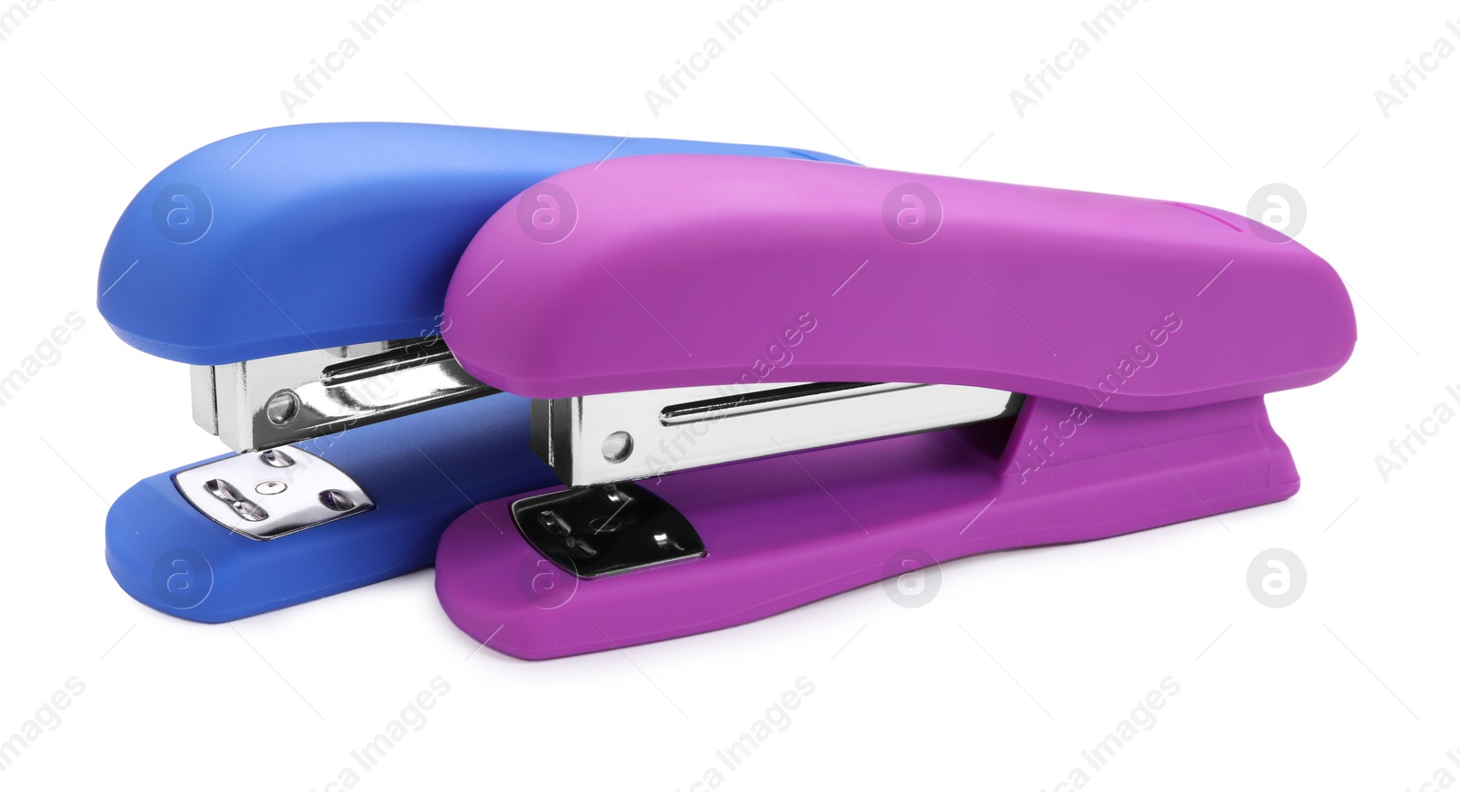 Photo of Two new bright staplers isolated on white