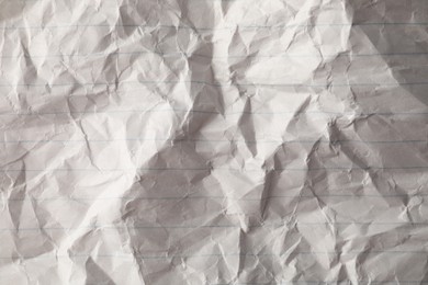 Crumpled sheet of paper as background, top view