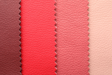 Photo of Leather samples of different colors for design as background, closeup