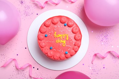 Photo of Cute bento cake with tasty cream and decor on pink background, flat lay
