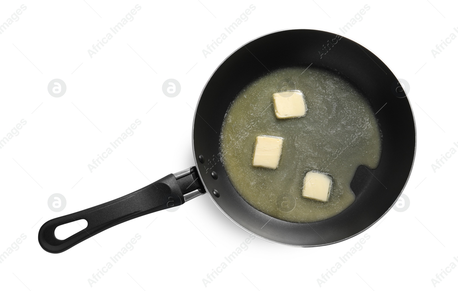 Photo of Melting butter in frying pan on white background, top view