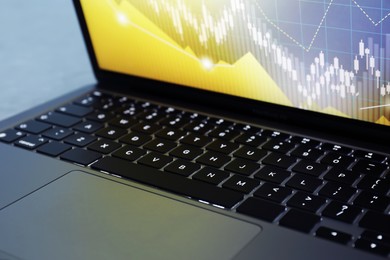 Laptop on light grey background, closeup. Modern technology