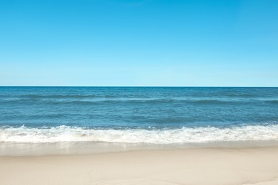 Photo of Picturesque view of beautiful sea and sandy beach on sunny day