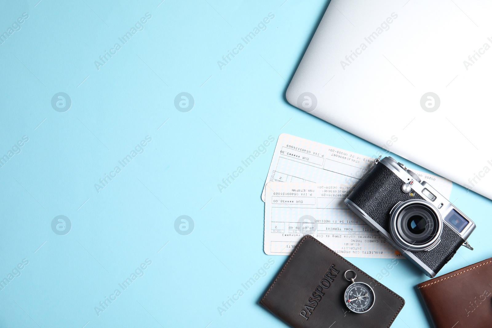 Photo of Flat lay composition with passport, camera and tickets on color background, space for text. Travel agency