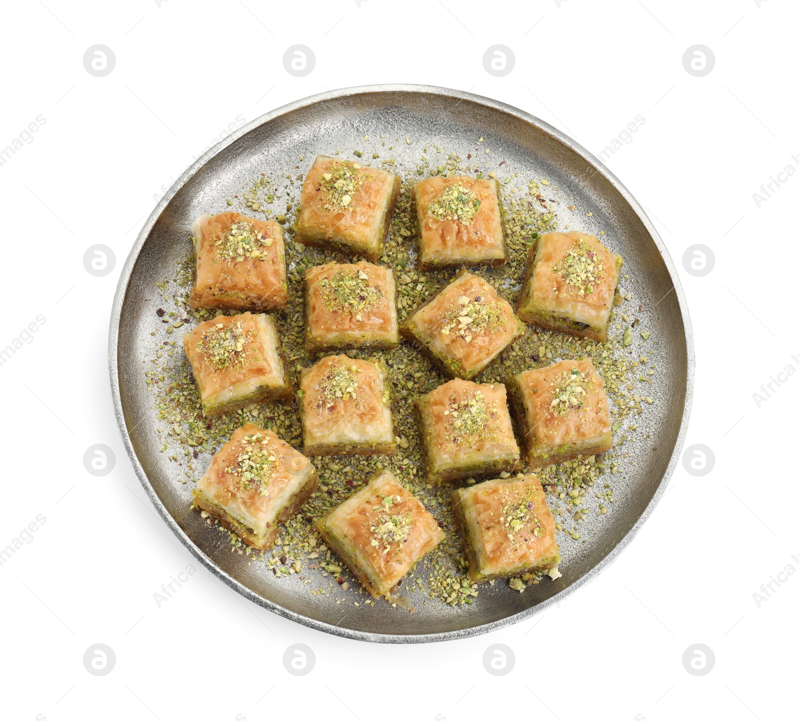 Photo of Delicious fresh baklava with chopped nuts isolated on white, top view. Eastern sweets