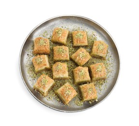 Photo of Delicious fresh baklava with chopped nuts isolated on white, top view. Eastern sweets