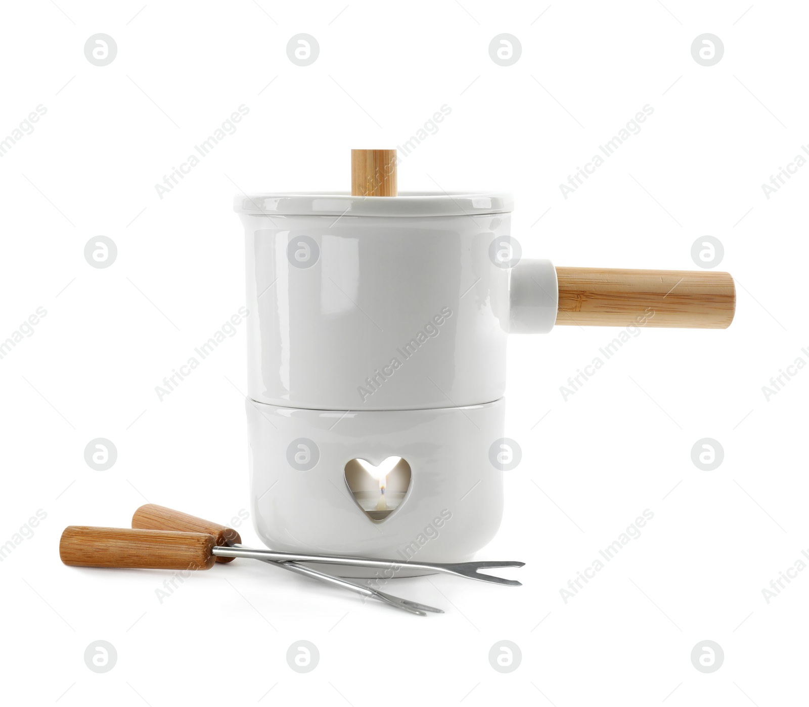 Photo of Empty pot for fondue and forks on white background