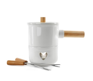 Photo of Empty pot for fondue and forks on white background