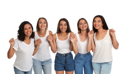 Photo of Happy women holding hands on white background. Girl power concept