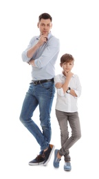 Portrait of dad and his son isolated on white