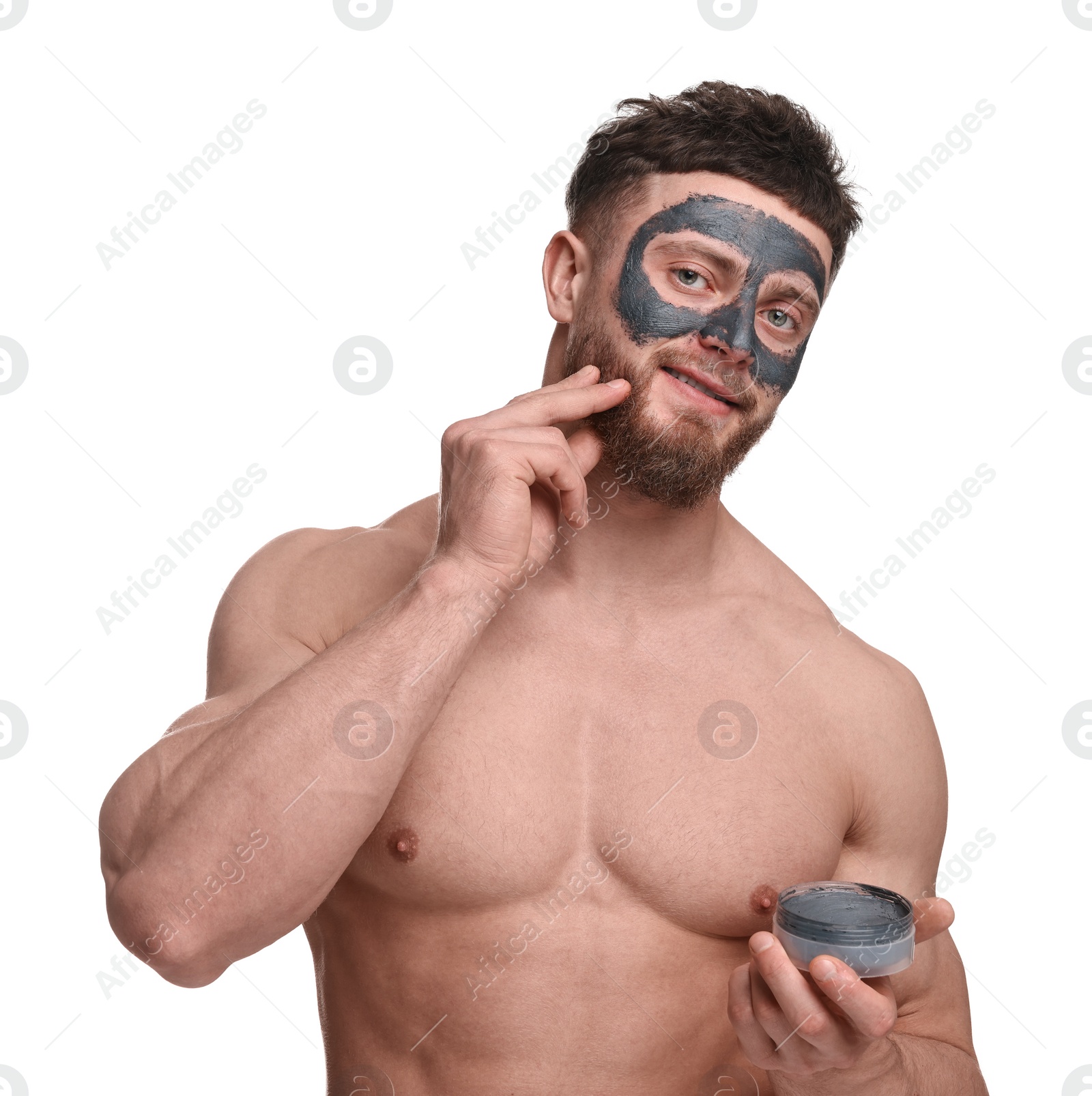 Photo of Handsome man with clay mask on his face against white background