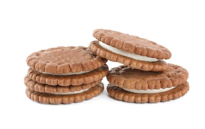 Photo of Tasty chocolate sandwich cookies with cream on white background