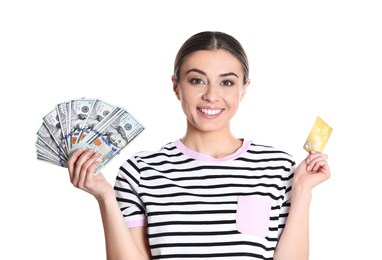 Portrait of young woman holding money banknotes and credit card on white background