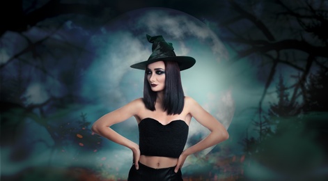 Image of Young girl dressed as witch in misty forest on full moon night. Halloween fantasy