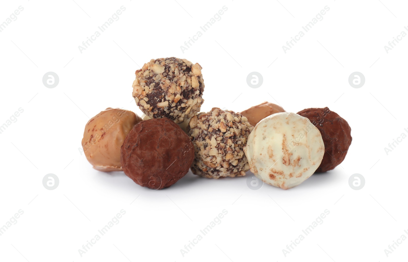 Photo of Different tasty chocolate candies isolated on white