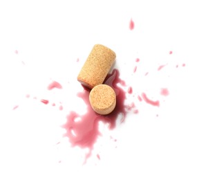 Photo of Bottle corks with wine stains on white background, top view