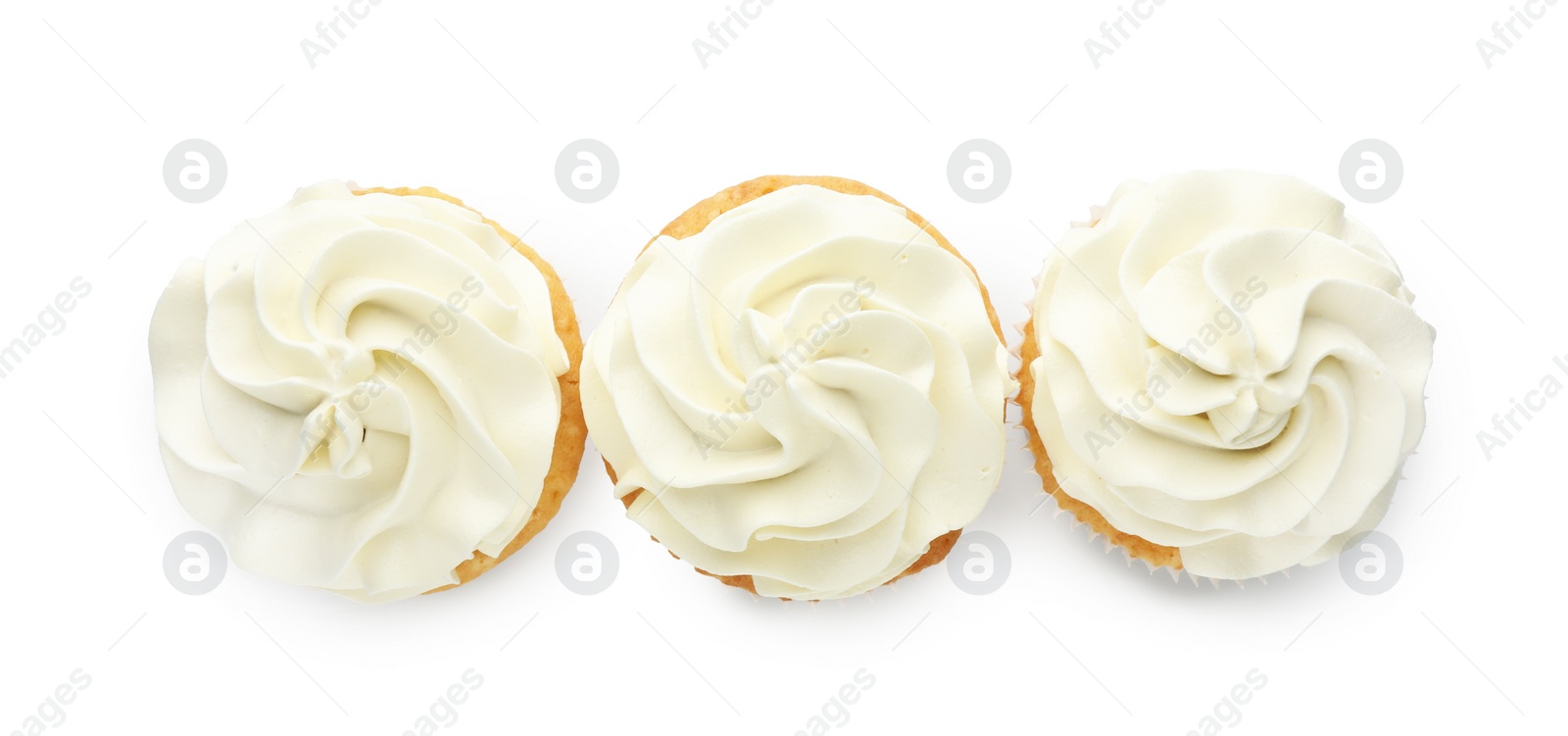 Photo of Tasty vanilla cupcakes with cream isolated on white, top view