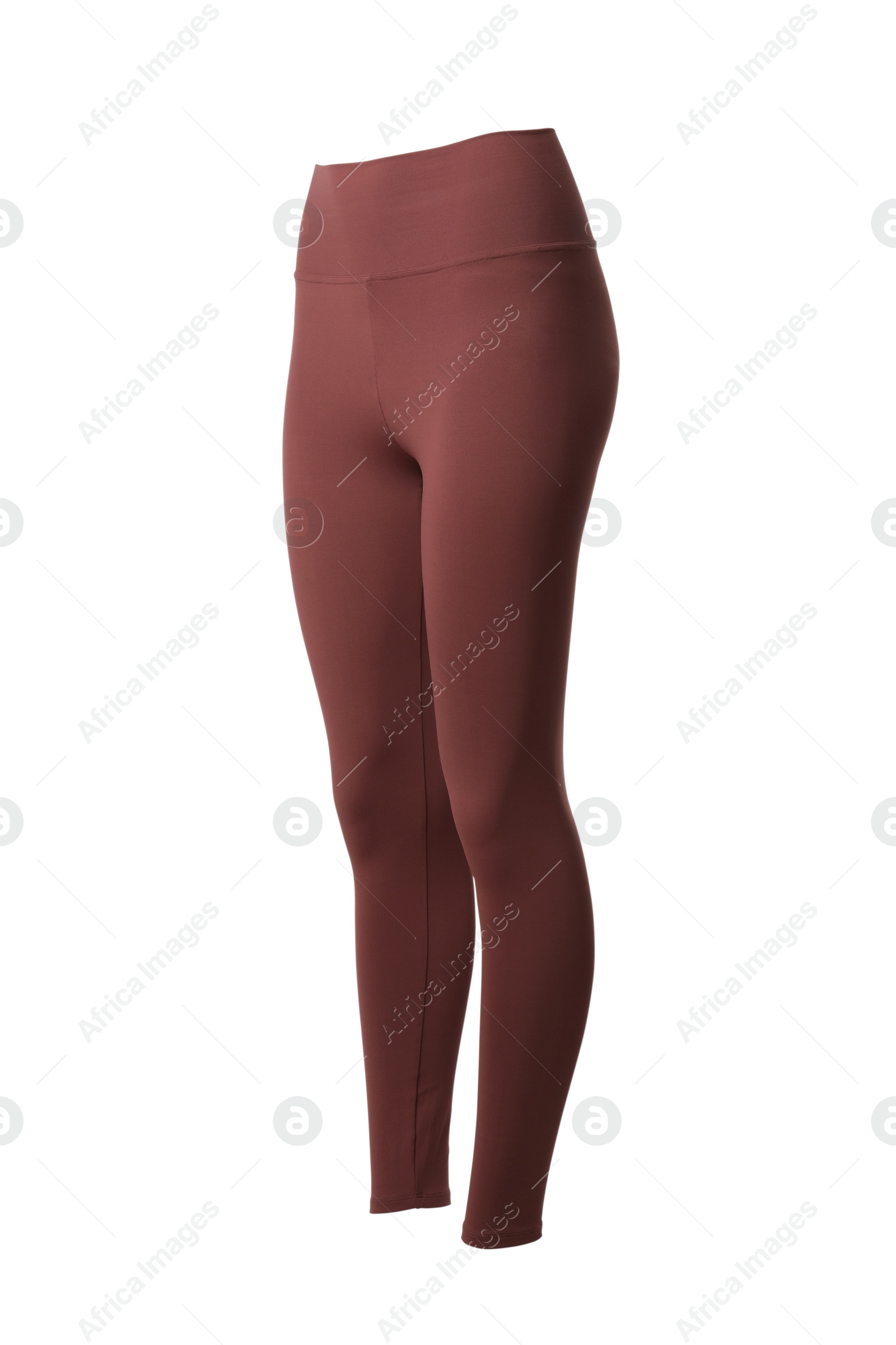 Photo of Pale red women's leggins isolated on white. Sports clothing