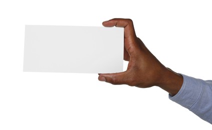 Photo of African American man holding flyer on white background, closeup. Mockup for design