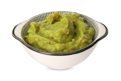 Photo of Bowl of delicious guacamole isolated on white