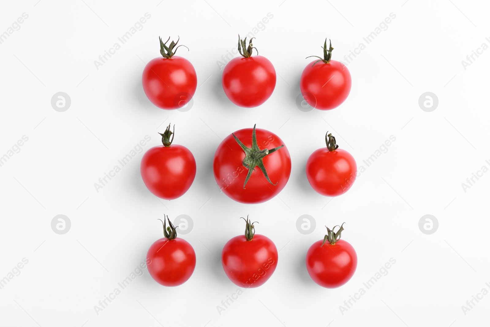 Photo of Many ripe tomatoes on white background, flat lay