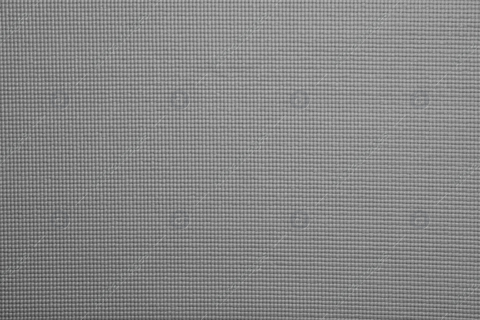 Photo of Grey sports mat texture as background, top view