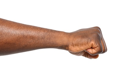 Photo of African-American man showing fist on white background, closeup