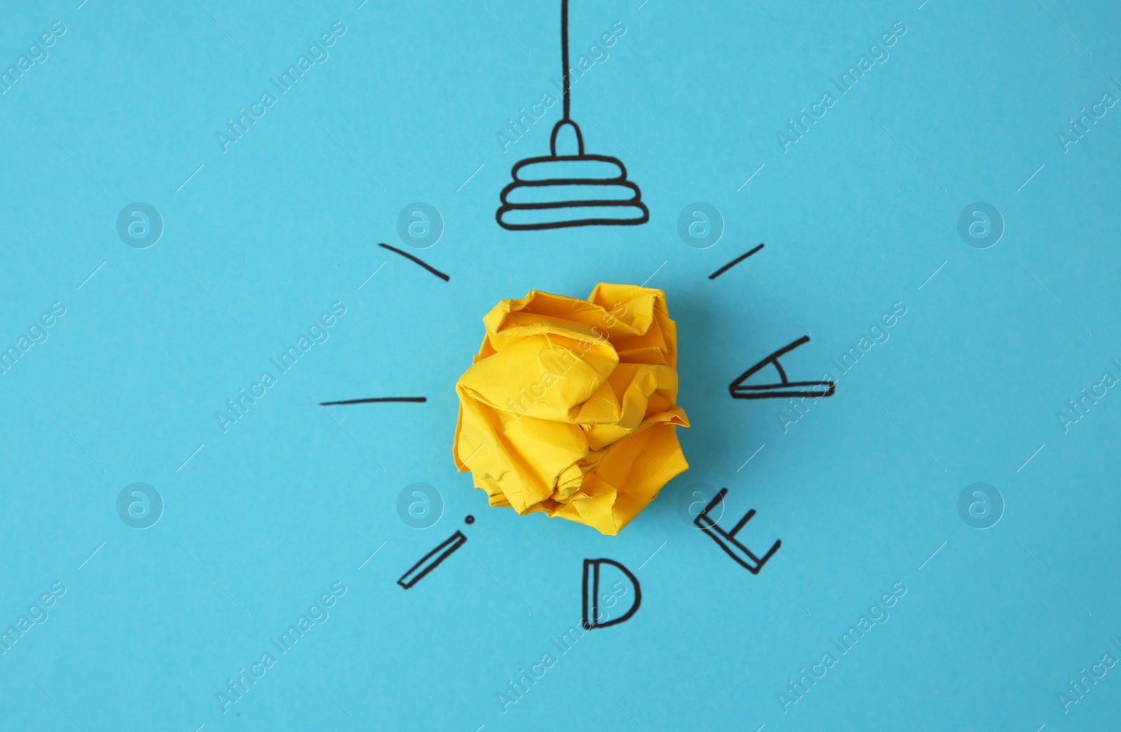 Photo of Composition with crumpled paper as lamp bulb and word IDEA on color background