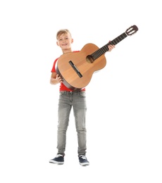 Photo of Little cute boy with wooden guitar, isolated on white