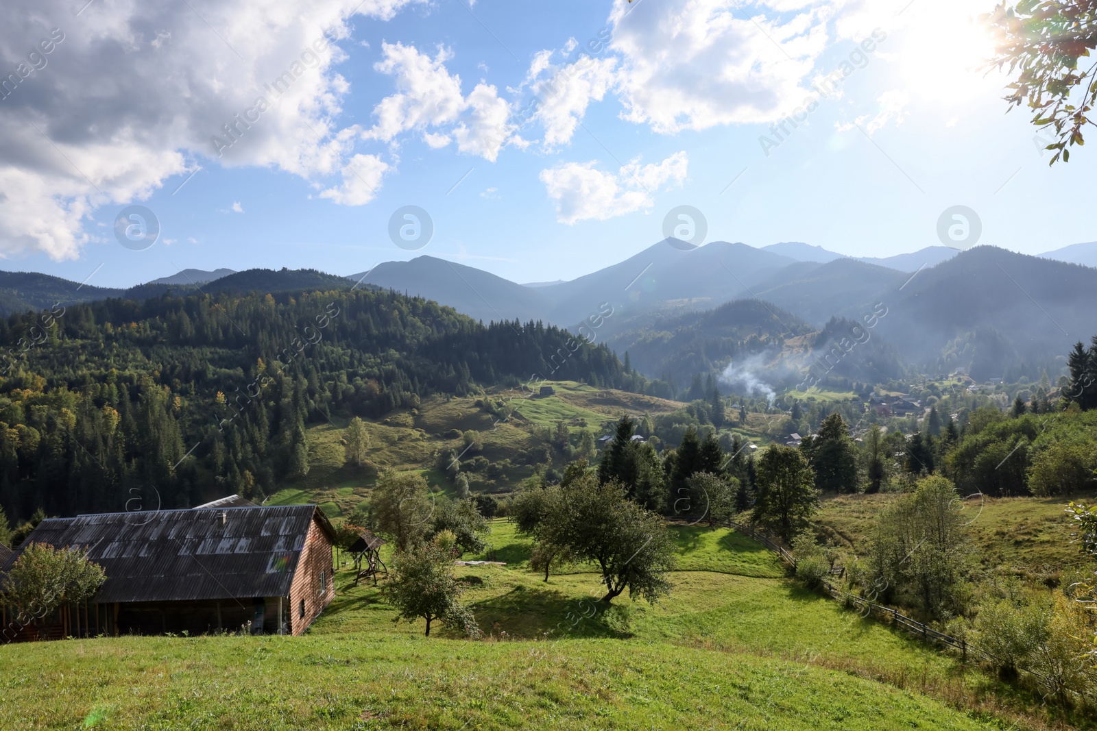 Photo of Beautiful view of village in mountains on sunny day