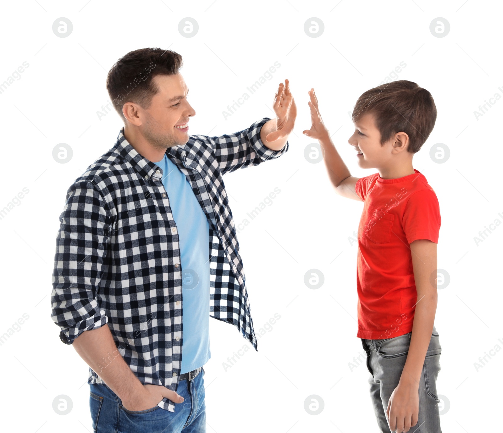 Photo of Portrait of dad and his son giving high five isolated on white