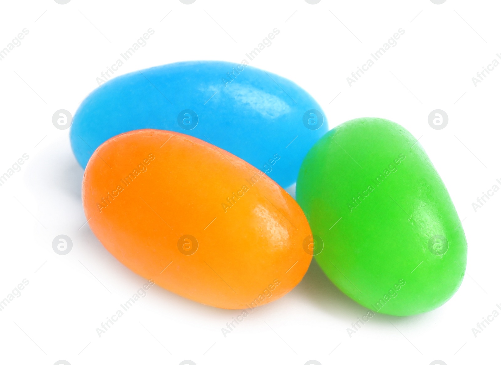 Photo of Delicious colorful jelly beans isolated on white