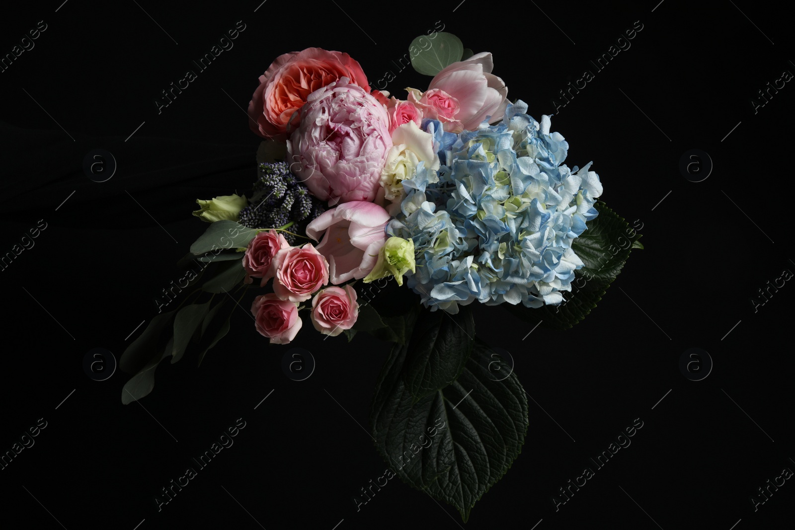 Photo of Beautiful bouquet of fresh flowers on dark background