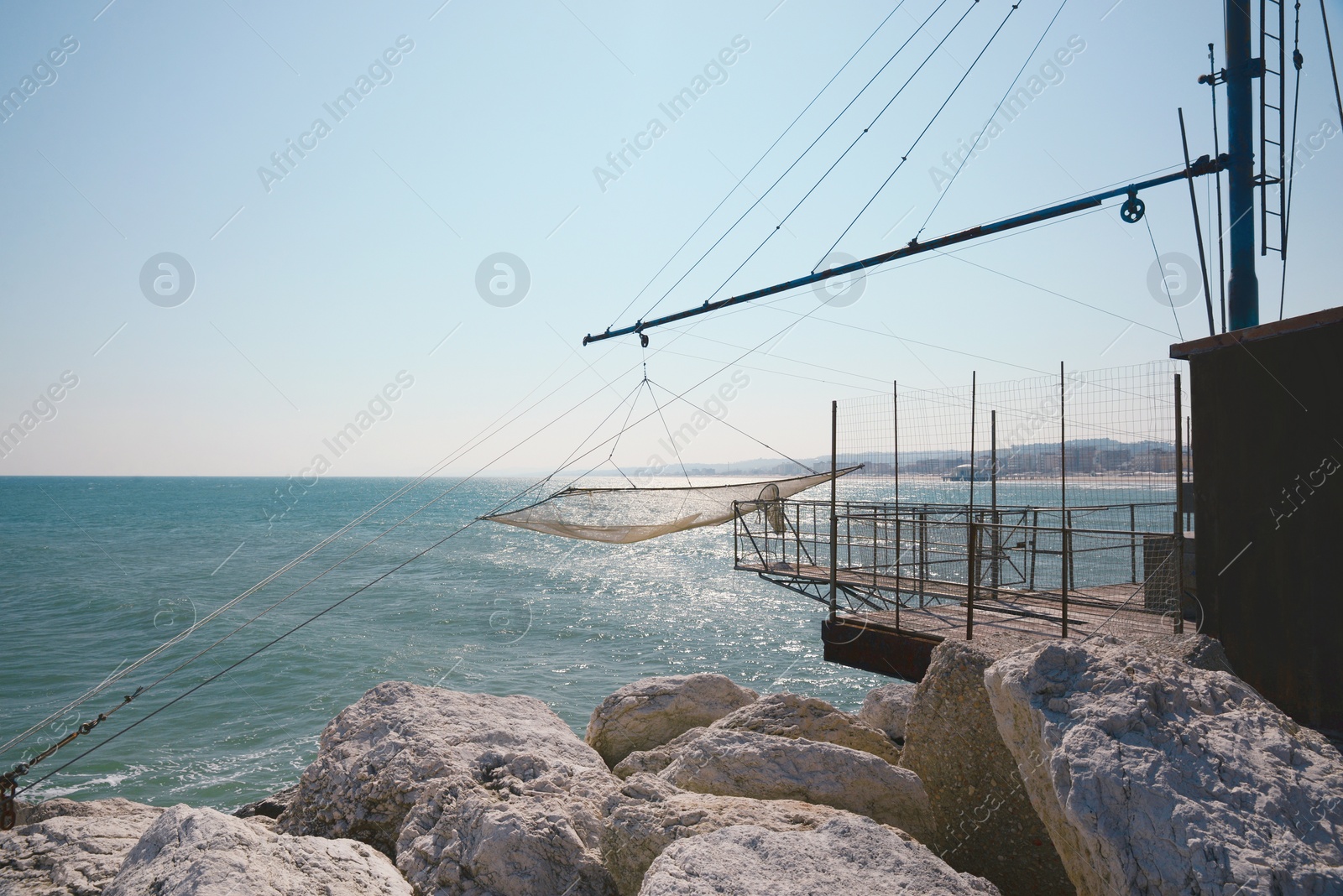 Photo of Shore operated stationary lift net on coast