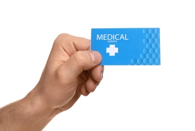 Man holding business card isolated on white, closeup. Medical service