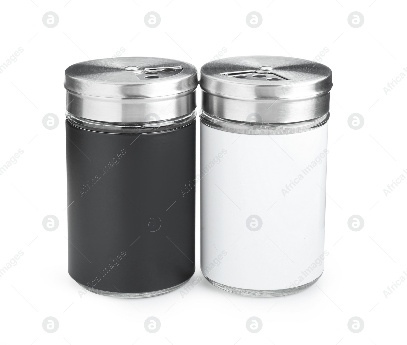 Photo of Salt and pepper shakers isolated on white