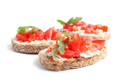 Photo of Delicious tomato bruschettas on white background. Traditional Italian antipasto