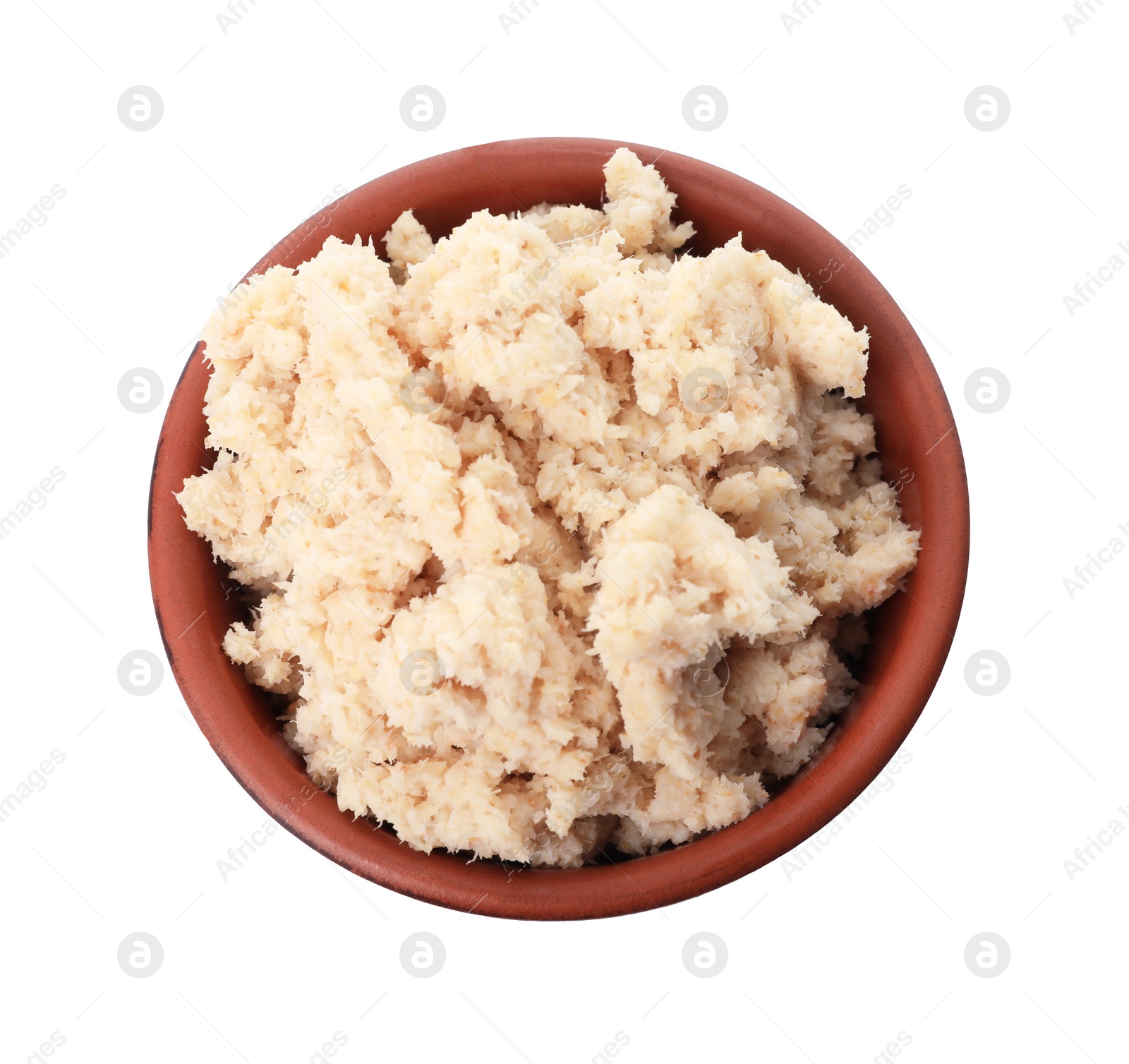 Photo of Bowl of tasty prepared horseradish isolated on white, top view