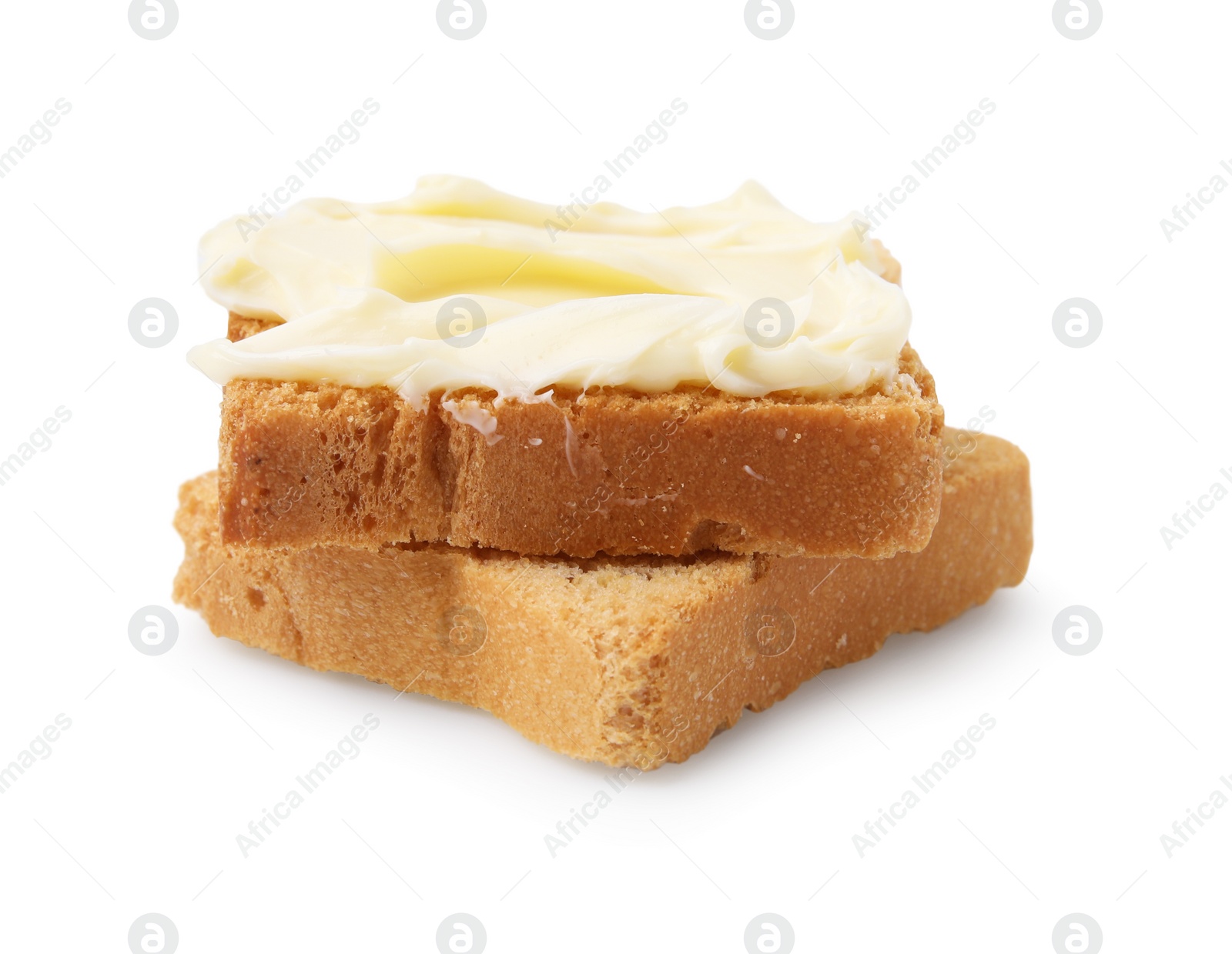 Photo of Slices of dry bread with butter isolated on white