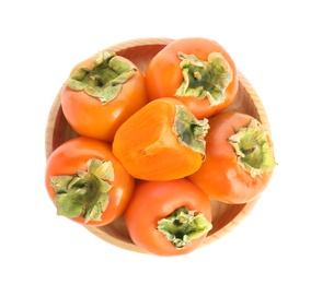 Photo of Bowl with delicious fresh persimmons isolated on white, top view