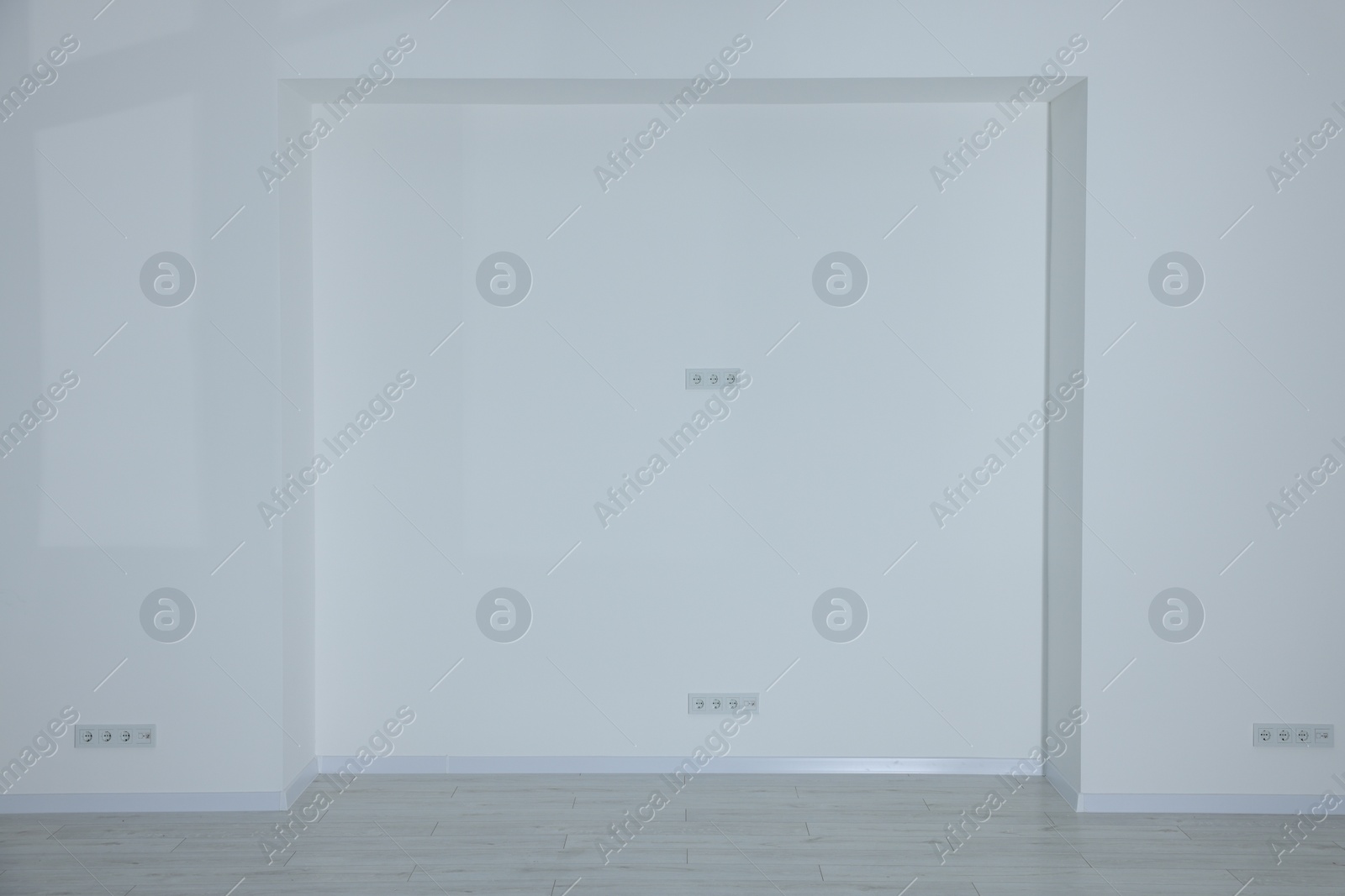 Photo of Niche on white wall in empty renovated room