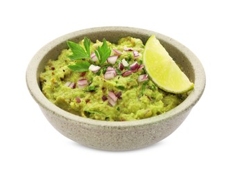 Photo of Bowl of delicious guacamole with lime isolated on white