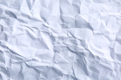 Crumpled sheet of paper as background, closeup