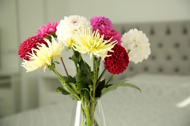 Photo of Bouquet of beautiful Dahlia flowers in vase at home, closeup