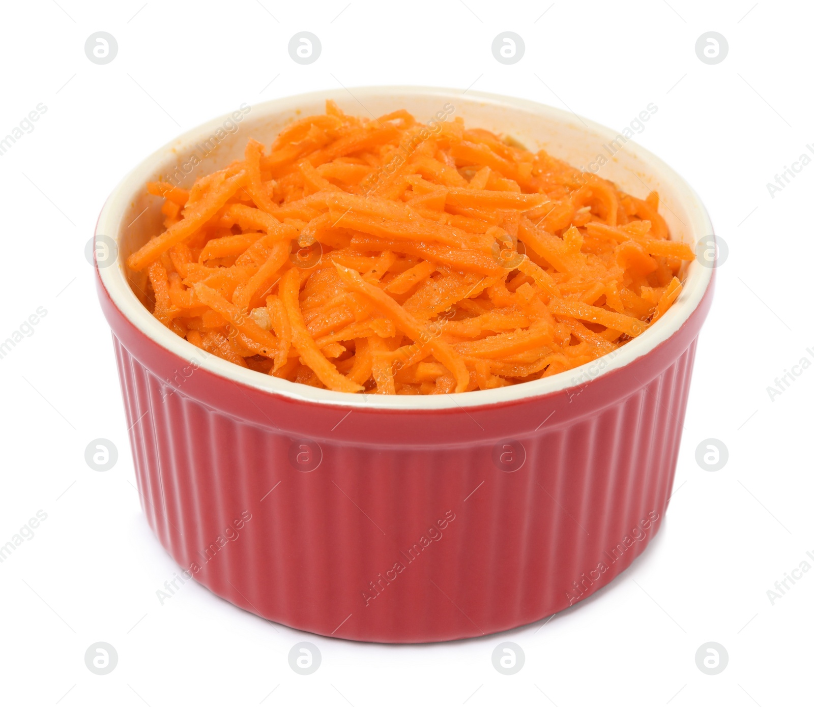 Photo of Delicious Korean carrot salad in bowl isolated on white