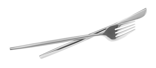 Fork and knife isolated on white. Stylish shiny cutlery set