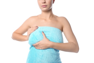 Photo of Woman checking her breast on white background, closeup