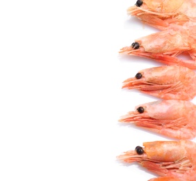 Photo of Raw shrimps on white background, top view