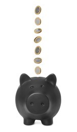 Image of Euro coins falling into black piggy bank on white background