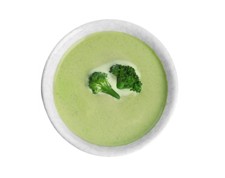 Photo of Delicious broccoli cream soup isolated on white, top view